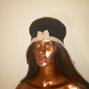 Black and tan women's woven hat with bow